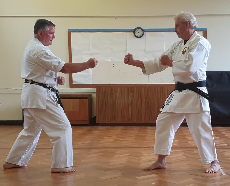 Kumite Kata No.1 opening posture with both practitioners in Migi Tate Seishan Dachi